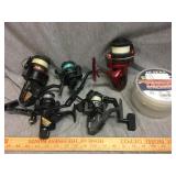 Lot of fishing reels and lot of new fishing line
