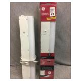 Pair of fluorescent light fixtures