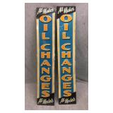 Pair of metal reproduction oil change signs