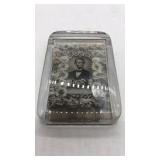 Abraham Lincoln commemorative glass paperweight.