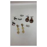 Five assorted pair of earrings.