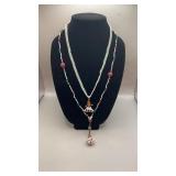 Two Native hand beaded necklaces.