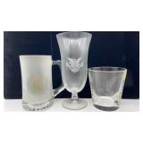 (3) different political glassware. All need