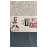 Vintage First Day issued stamps on envelope.