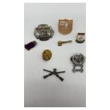 Assorted  vintage hat or lapel pins.