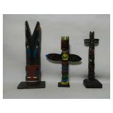 3 Hand Crafted Totem poles. Approximately 5.5" to