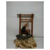 Native American wooden figurine. Stands