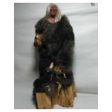 Wood carved Native American Indian. Iron Belly