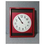 Wooden frame Wall clock. Battery operated and