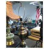 Brass finish metal lamp. No shade. Tested and