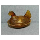 Amber colored Chicken on best. Approximately 6"