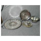 4 Assorted Silver Plated serving dishes.