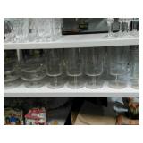 Shelf lot of Glasses. Some sherbet glasses, and