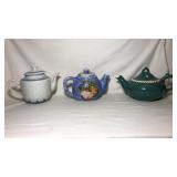 3 Assorted ceramic teapots. Green has few chips