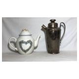 Ceramic teapot and silver plater pot.