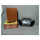 Boom box and New cassette storage folders. Boom