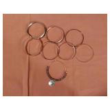 8 Assorted Bracelets. Thick and thin bangle