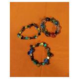 3 Assorted Glass Beaded bracelets.