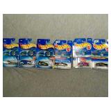 6 Assorted Hot Wheels cars. All New