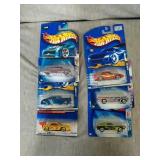 6 Assorted Hot Wheels cars. All New