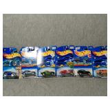 6 Assorted Hot Wheels cars. All New