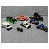 Assortment of vehicles. Cars, and trucks.