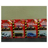 Lot of 4 New in package,  TONKA DieCast cars &