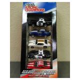 New in opened package, 5 Racing Champions DieCast