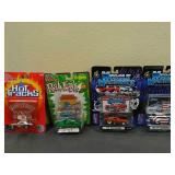 4 Assorted DieCast car replicas,