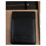 Lot of approximately 100 leather bound note pads