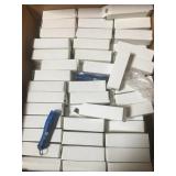 Lot of approximately 300 mini TXU flashlights