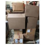 Pallet full of new clothing items, shirts,