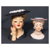 Pair of vintage lady head vases