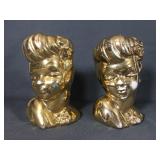 Pair of gold colored glamor Girl head vases