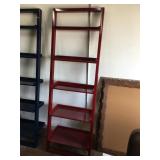 Leaning wall shelf red in color