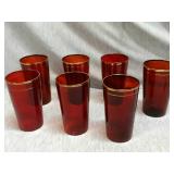 Lot of 7 Red glasses with gold trim on top