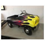 Instep metal peddle car