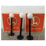 Two sets of Lionel three globe lights
