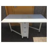 Drop leaf rolling table