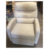 Grey lazy boy fabric rocks and swivels recliner