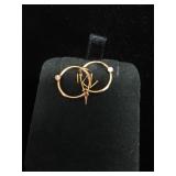 Pair of 10kt gold small round hoop earrings each