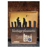 Vantage Pleasures Metal Tin Sign