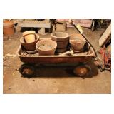 Vintage old wagon with flower pots