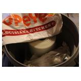 Garbage Can full of retail bags & Plastic Sheeting