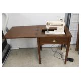 Singer Sewing Machine in Cabinet