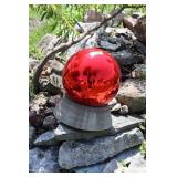 Red Gazing Ball on Concrete Stand