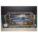 NIB Road Tough 1964 Shelby Cobra 427 S/C  1:18 Die