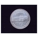General motors silver coin