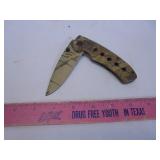 Cammo lock blade knife