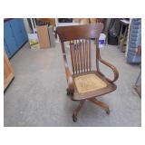 Rolling Wicker Bottom Captains Chair